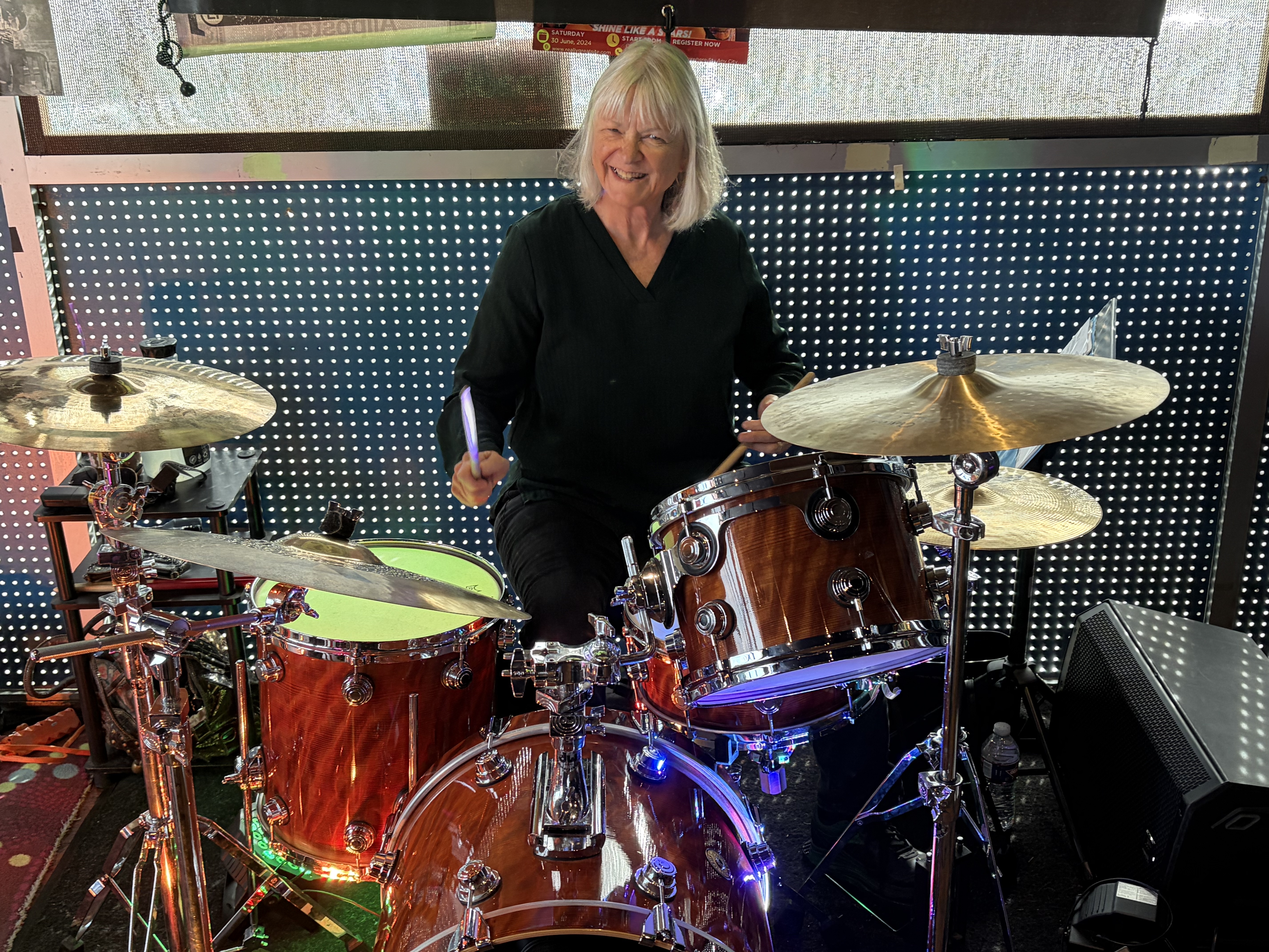 Kathy Black playing drums